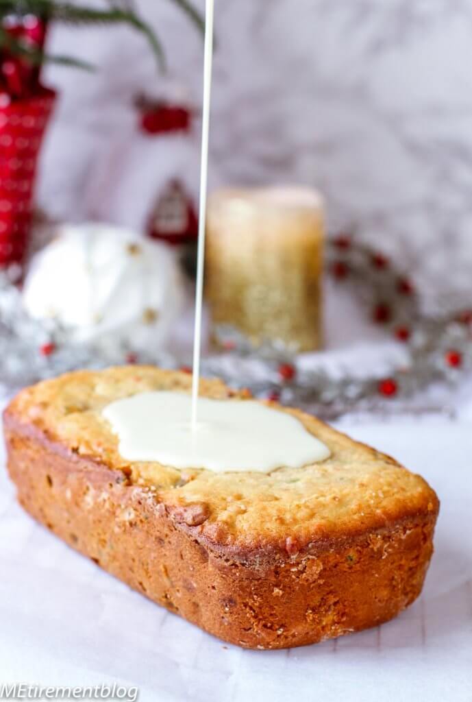 Cream Cheese Fruitcakes with White Chocolate Frosting being poured on top