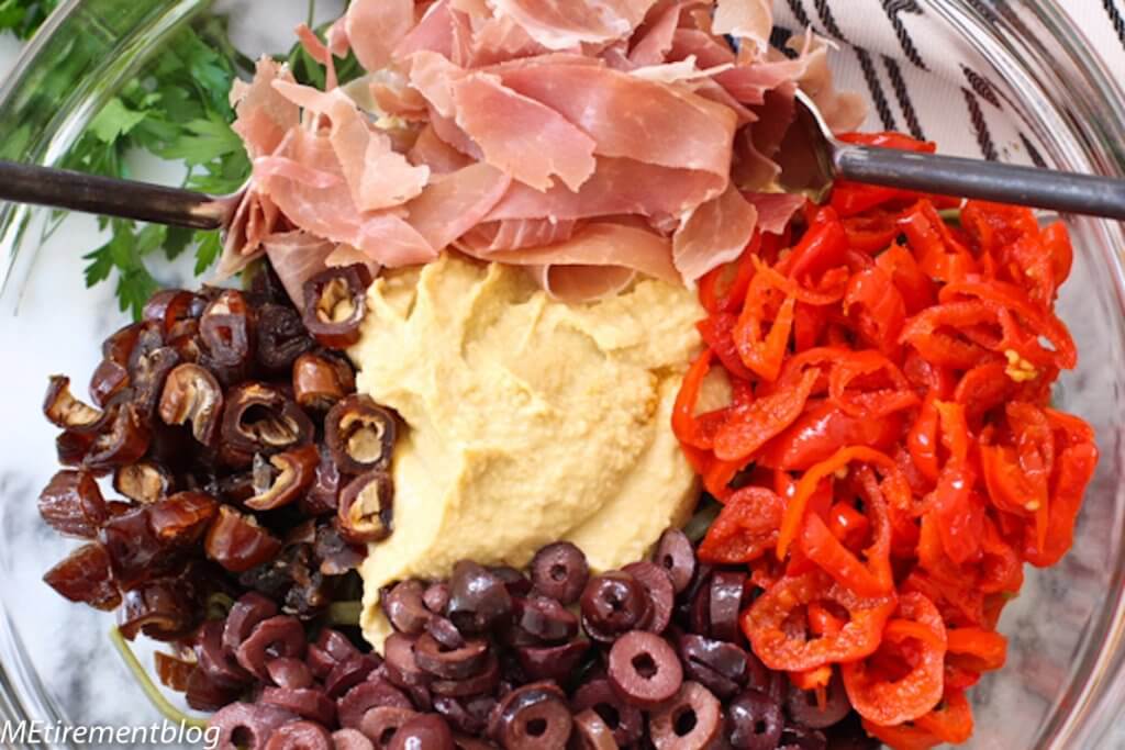 Hummus Pasta with Kalamata Olives Goat Cheese and Prosciutto