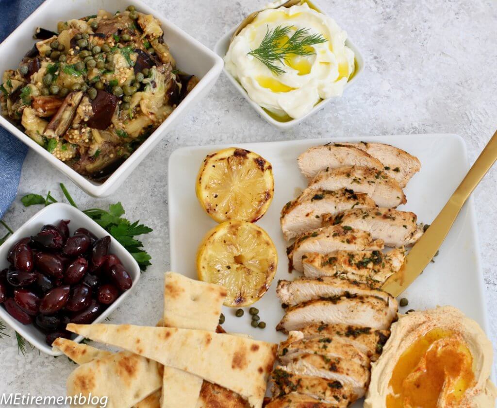 Mediterranean Grilled Chicken Platter with Sweet and Savory Eggplant, Labneh, Feta and Hummus