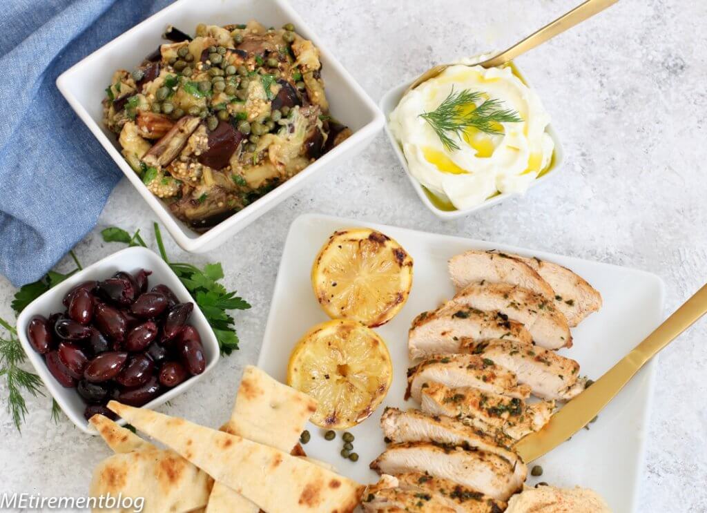 Mediterranean Grilled Chicken Platter with Sweet and Savory Eggplant, Labneh, Feta and Hummus